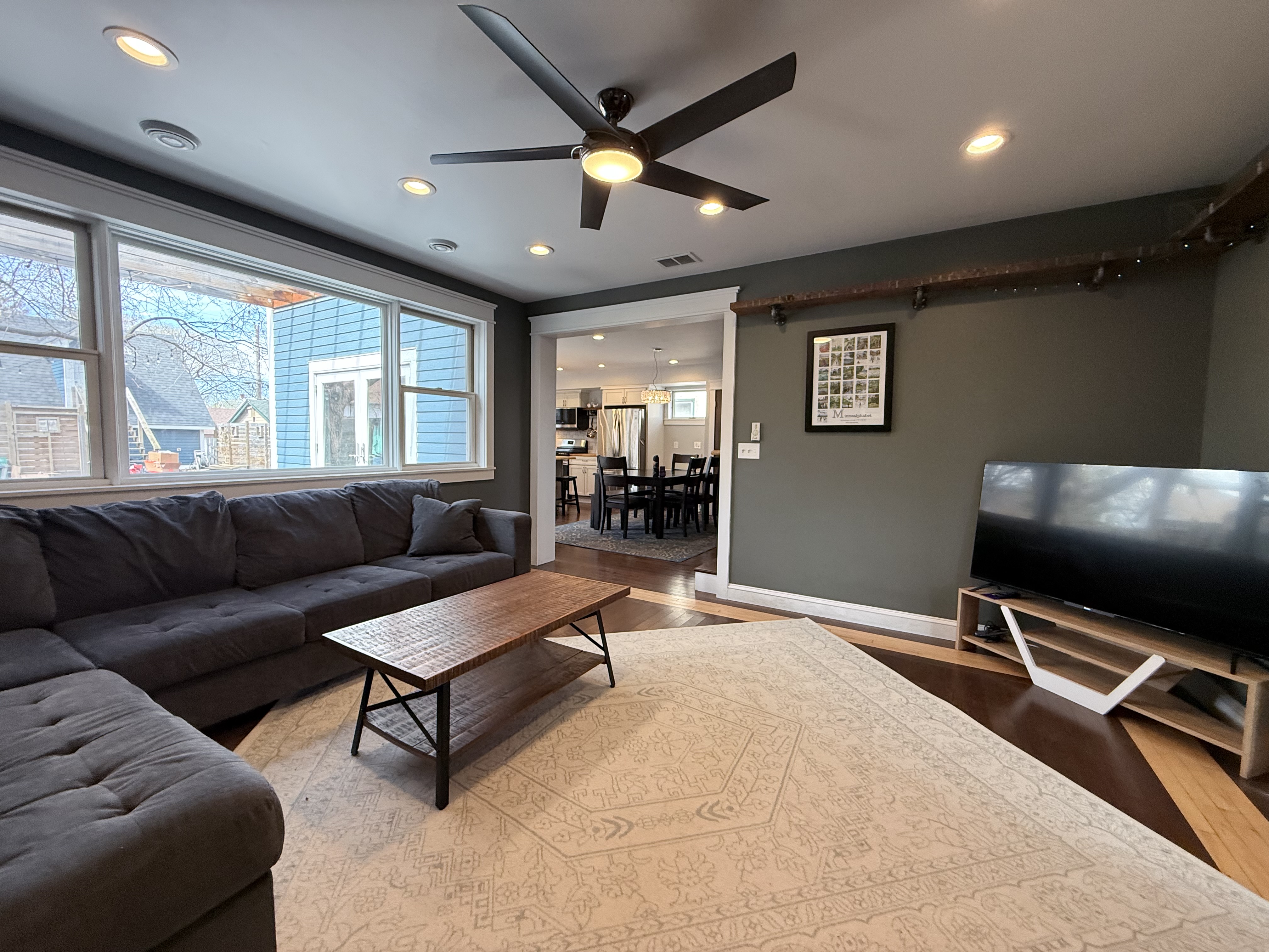 Living room with view through to kitchen